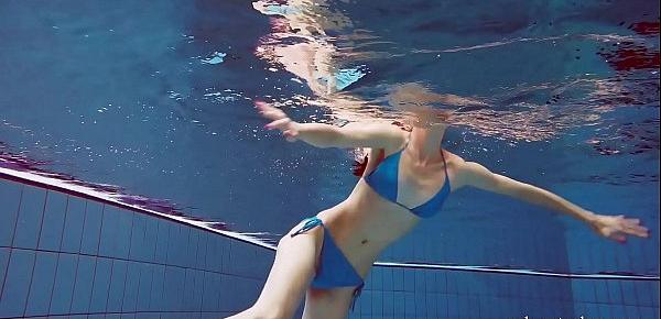  Hot teen Martina swims naked underwater